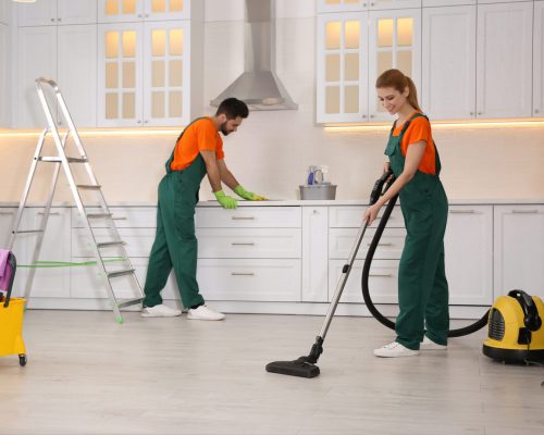 Team,Of,Professional,Janitors,Cleaning,Modern,Kitchen